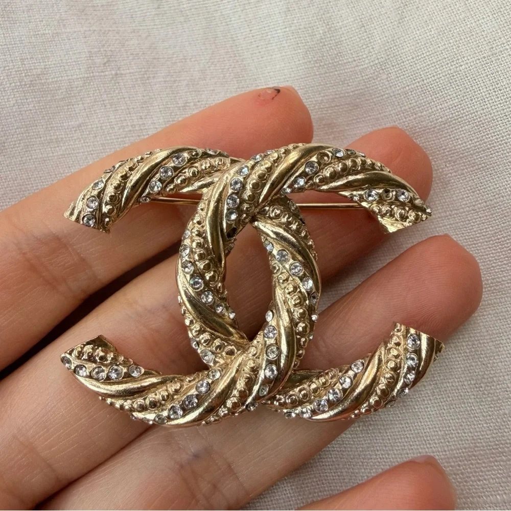 CHANEL Twisted Gold and Silver Brooch - Picture 1 of 10